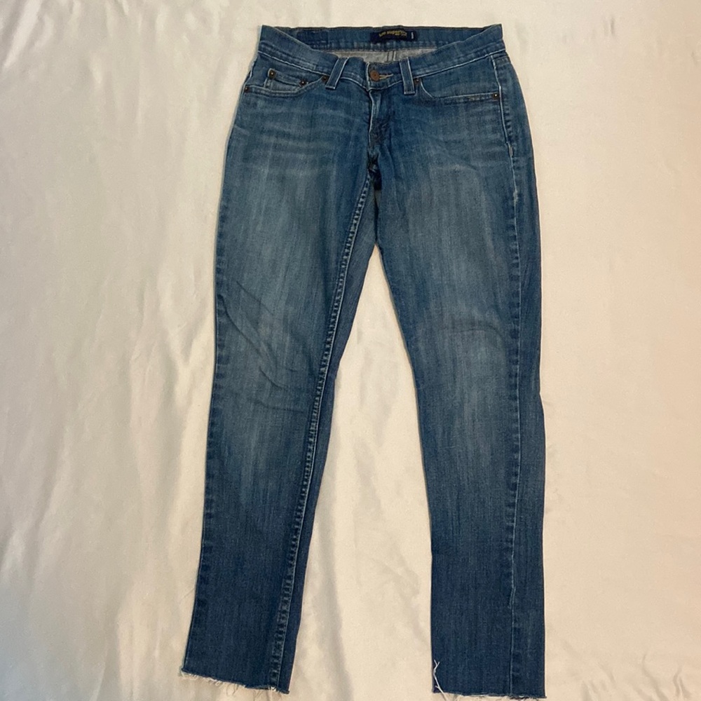 Levi’s low rise skinny jeans.